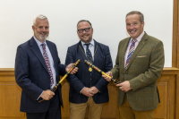 New Members Mark Mitchell (left) and Graeme Sinclair (right) with Moderator David B Cuthbert Jnr, after swearing the Oath of Allegiance to Her Majesty Queen Elizabeth II in front of Depute Provost Andrew Parrot 5 September 2022 (Photo by kind permission of Richard Wilkins)